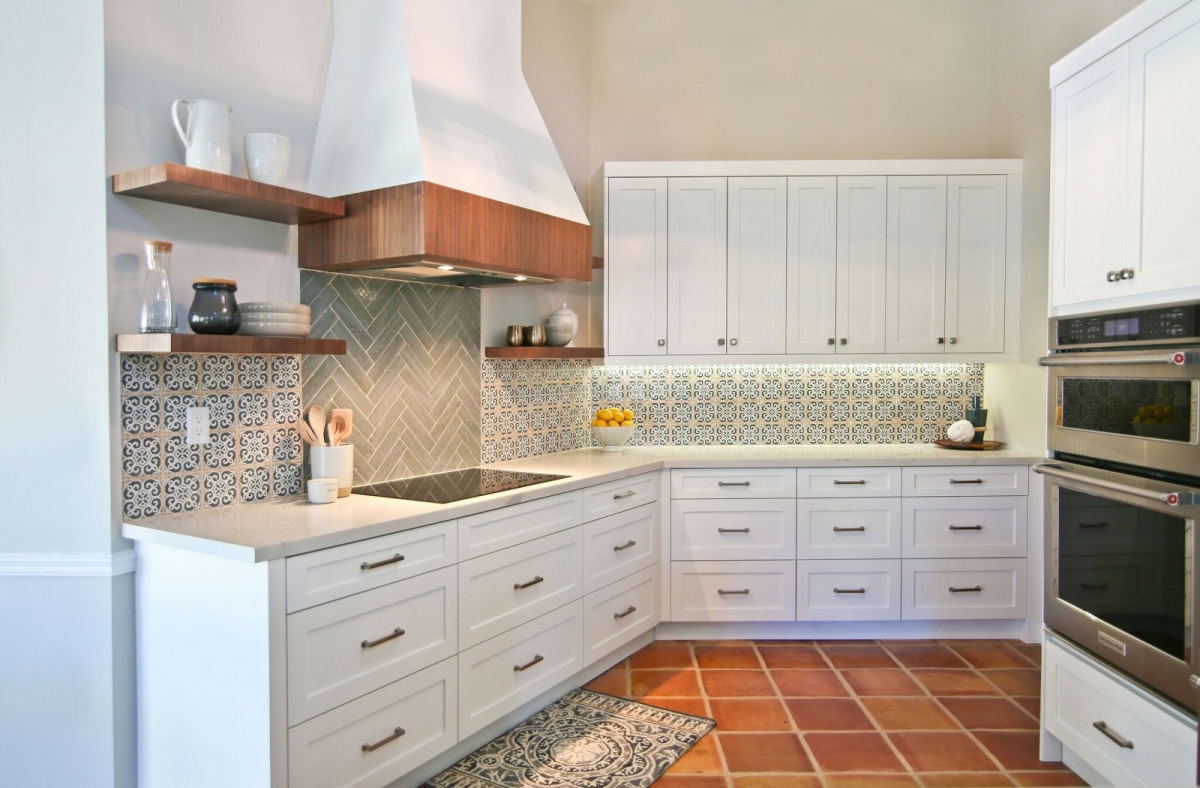contemporary spanish inspired style kitchen design herringbone tiles backsplash wood shelves