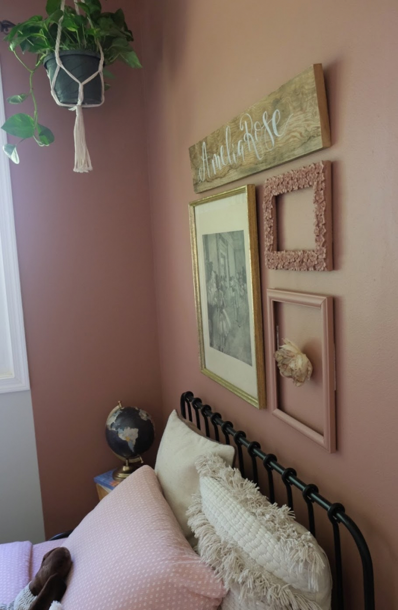 darla powell miami interior design firm little girl's bedroom gallery wall pink frames wood plank ballerinas