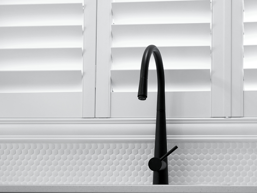 darla powell interiors kitchen renovation design inspiration black faucet white backsplash