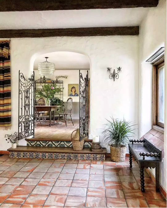 spanish style home coral gables fl wrought iron wood beams white walls clay tile